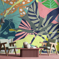 Fotomural Walls by Patel - Photo wallpaper »anais 1« - Abstract jungle leaves on concrete plaster texture - Colourful