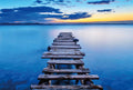 Fotomural Photo wallpaper old pier in the lake - blue, yellow, grey - DD Motive 2