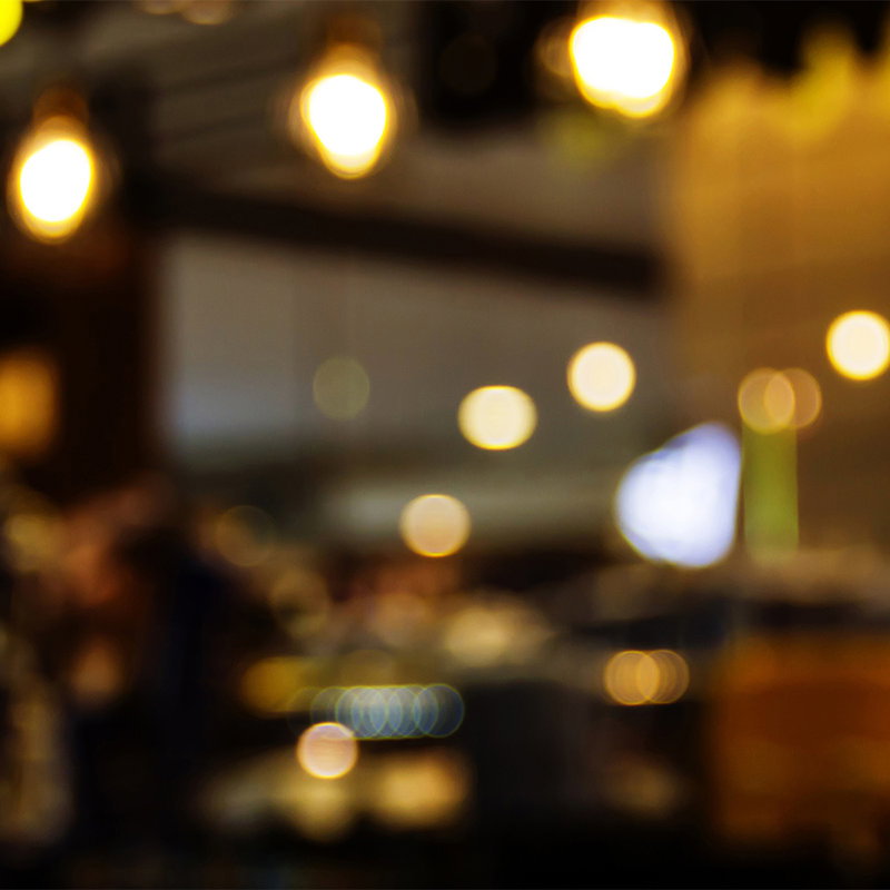 Fotomural Walls by Patel - Big City Night 1 - Bar Wallpaper, Urban Nightlife - Yellow, Orange