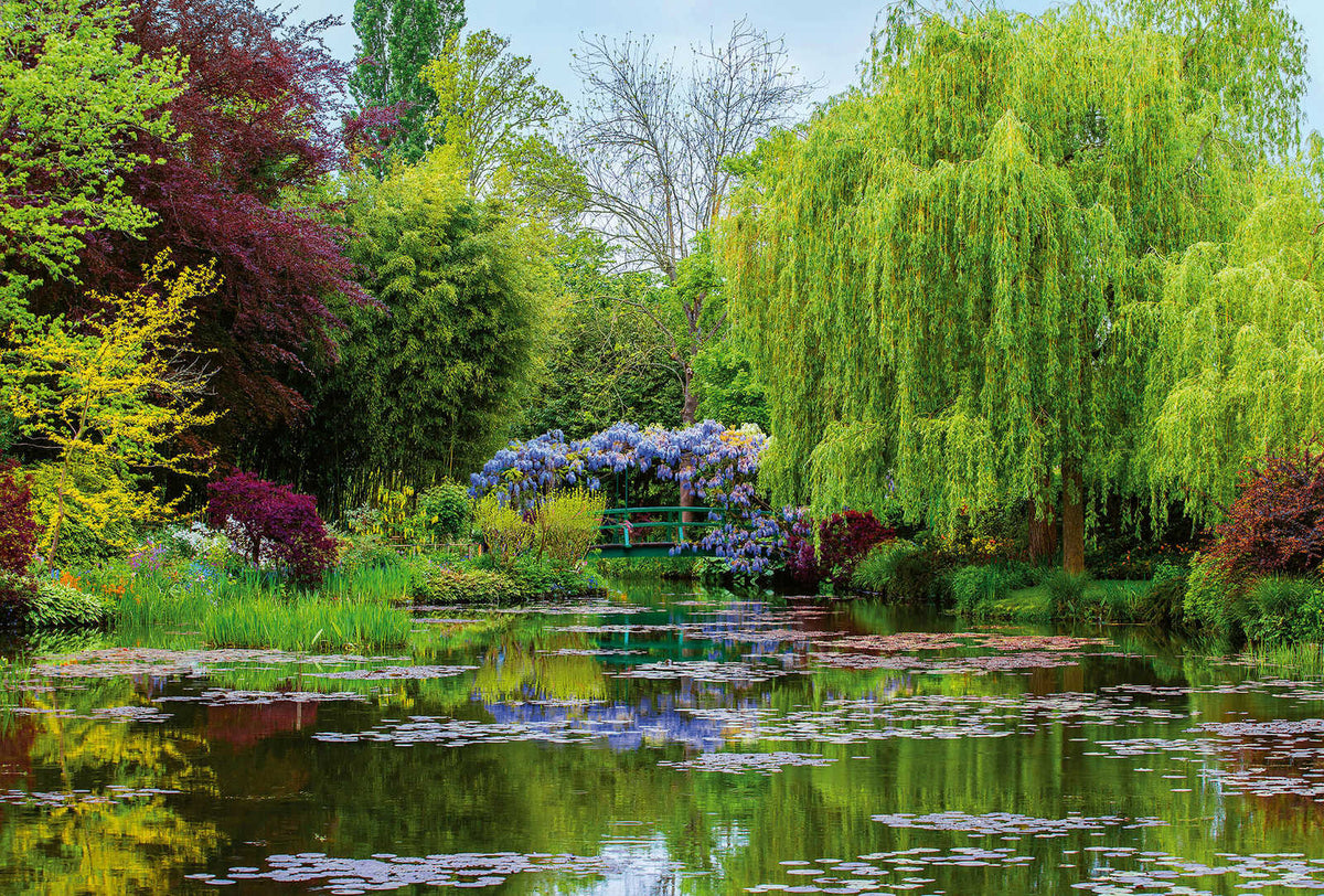 Fotomural Photo wallpaper nature garden with lake - green, red, blue - DD Motive 2
